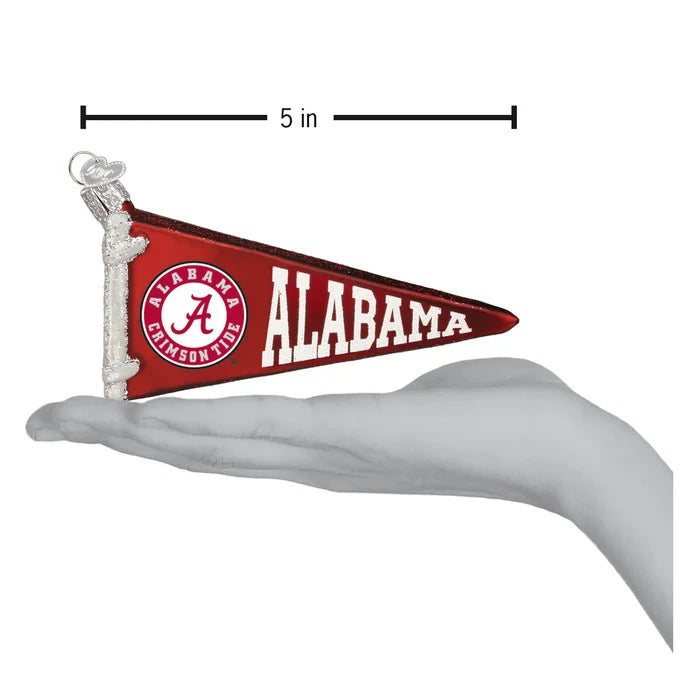 Small red and white Alabama pennant flag ornament held in a hand with measurement label.