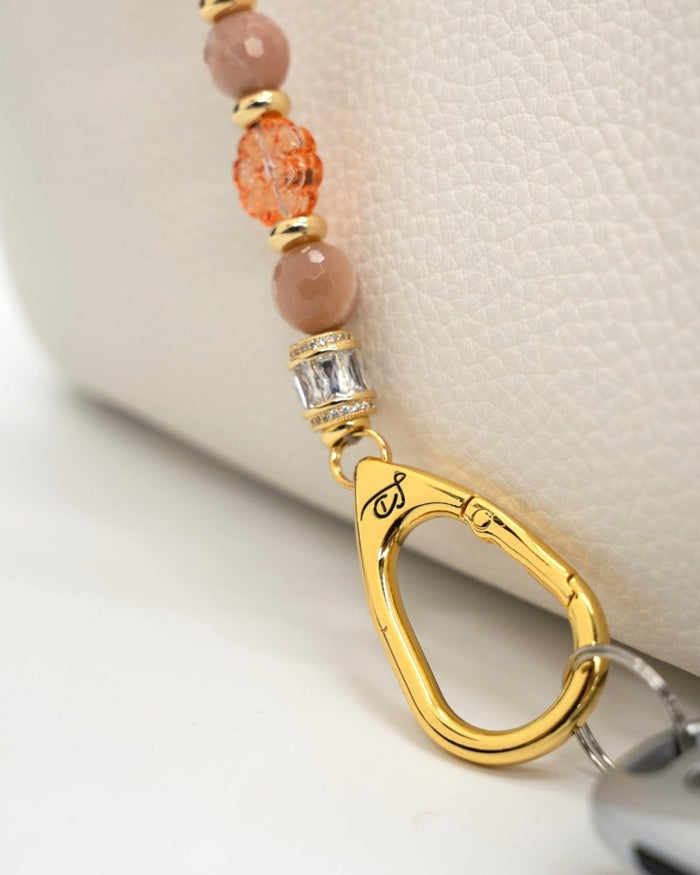 LD Keyfinder Birdsong Bliss beaded keychain with sunstone, coral flower beads, and a gold-plated bird charm.