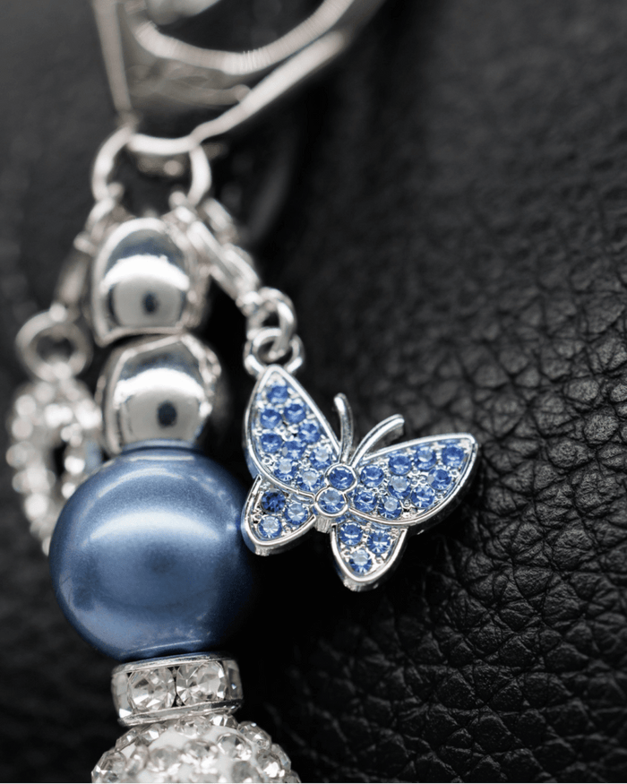 Silver plated blue butterfly rhinestone charm