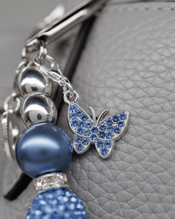 Silver plated blue butterfly rhinestone charm