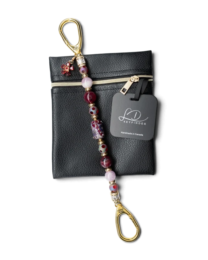 LD Keyfinder Bordeaux Bloom beaded keychain with burgundy agate, lavender kunzite, and gold-plated flower charm.