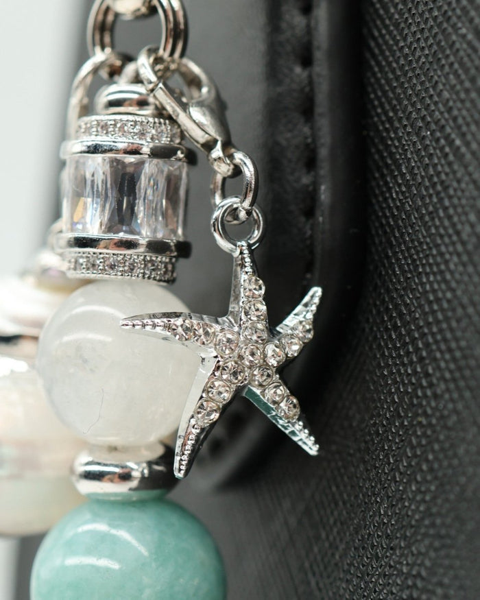 LD Keyfinder Caribbean Pearl accessory featuring a rhinestone starfish charm, aqua jade, and moonstone beads.