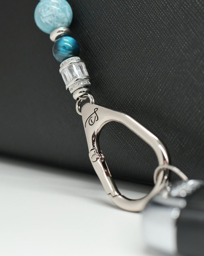 LD Keyfinder Celestial Tide lanyard with turquoise, aqua, blue teal tiger eye, larimar beads, silver accents, and star charm.