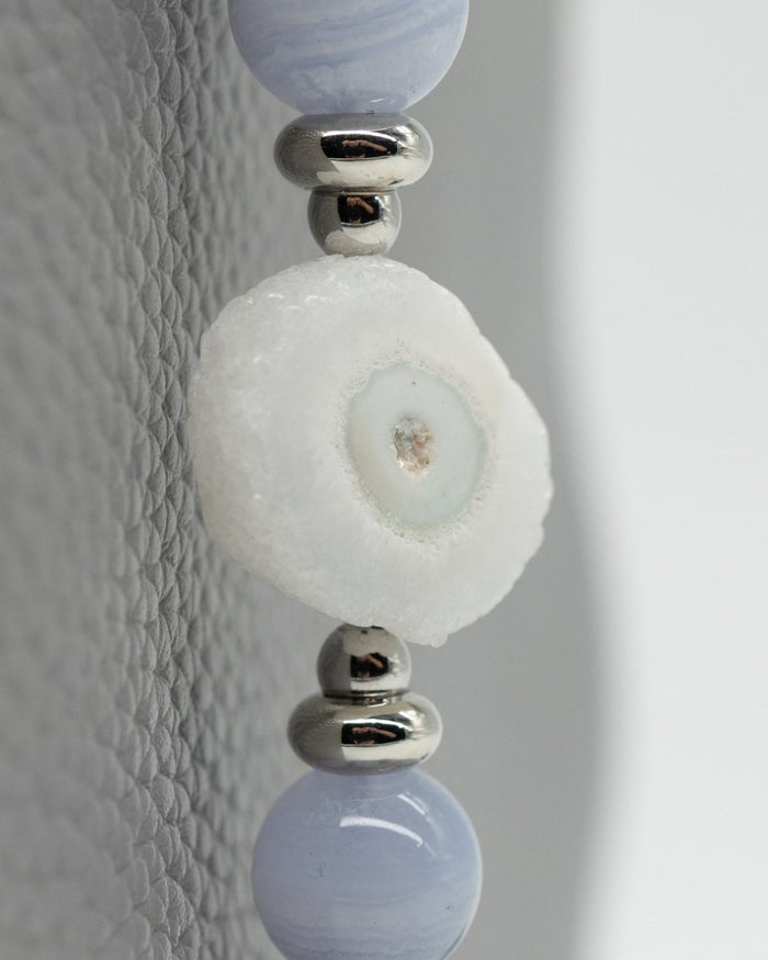 LD Keyfinder Cloud Dancer featuring blue lace agate, rainbow moonstone, and a natural sunflower druzy agate slice.