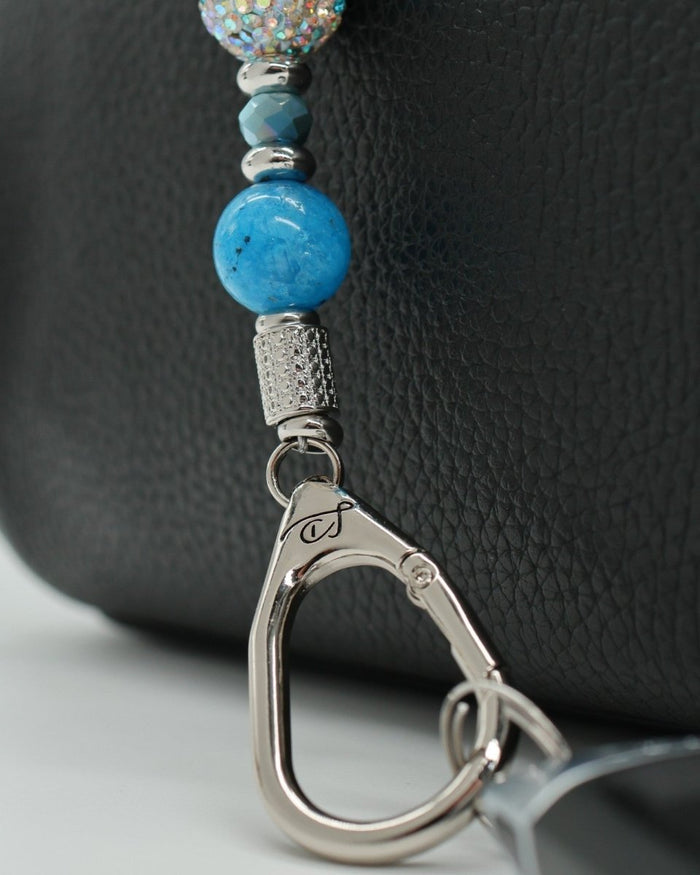 LD Keyfinder Coastal Tide Mini keychain with blue hemimorphite bead, Austrian crystal bead, and silver charms.