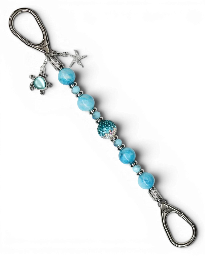 LD Keyfinder Coastal Tide keychain with aqua hemimorphite beads, crystal center bead, turtle and starfish charms.