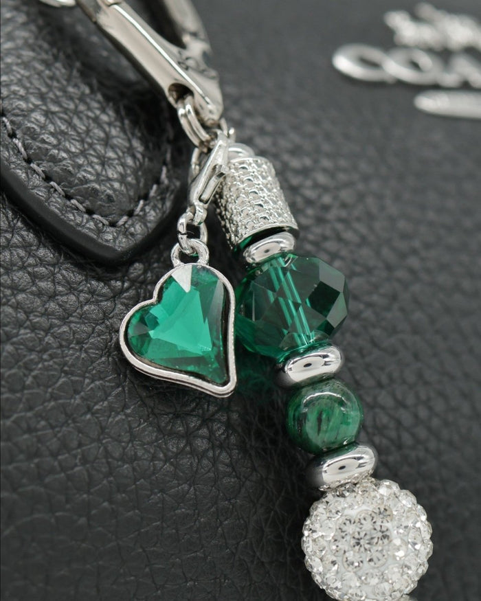 Green faceted glass heart charm