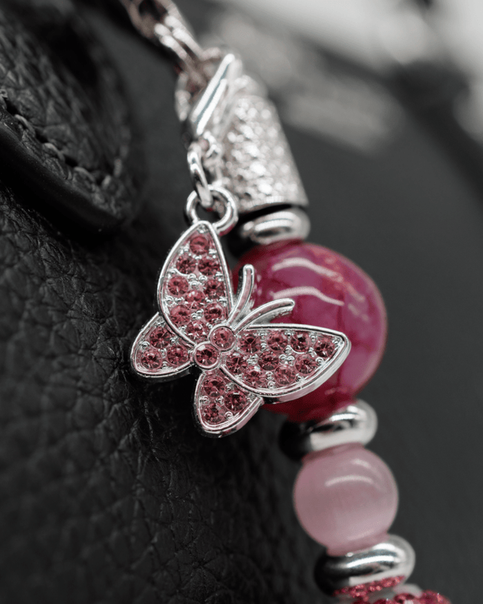 Platinum plated pink rhinestone butterfly charm