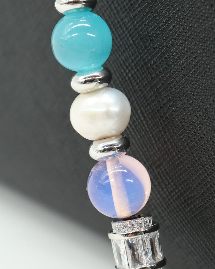 LD Keyfinder Garden Serenade featuring freshwater pearls, aqua cat's eye, pink opalite, and baguette rhinestone beads.