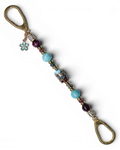 LD Keyfinder Gilded Fantasy keychain with sky blue and topaz glass art bead, larimar, purple tiger eye, gold-plated beads, and blue flower charm.