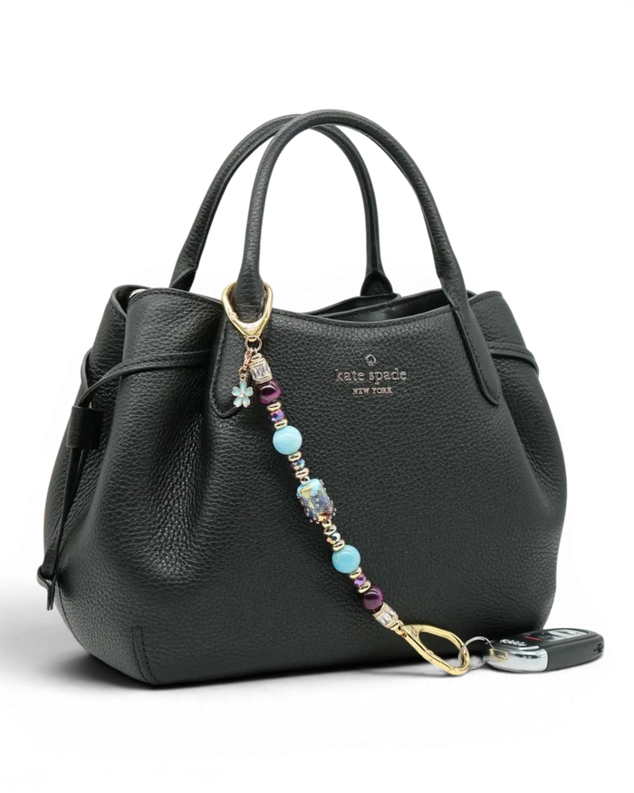 LD Keyfinder Gilded Fantasy keychain with sky blue, topaz, purple, and gold beads, a blue flower charm, and a rhinestone accent.