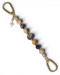 LD Keyfinder Golden Nebula keychain with purple and gold artisan glass bead, fossil coral, amethyst, and gold-plated star charm.
