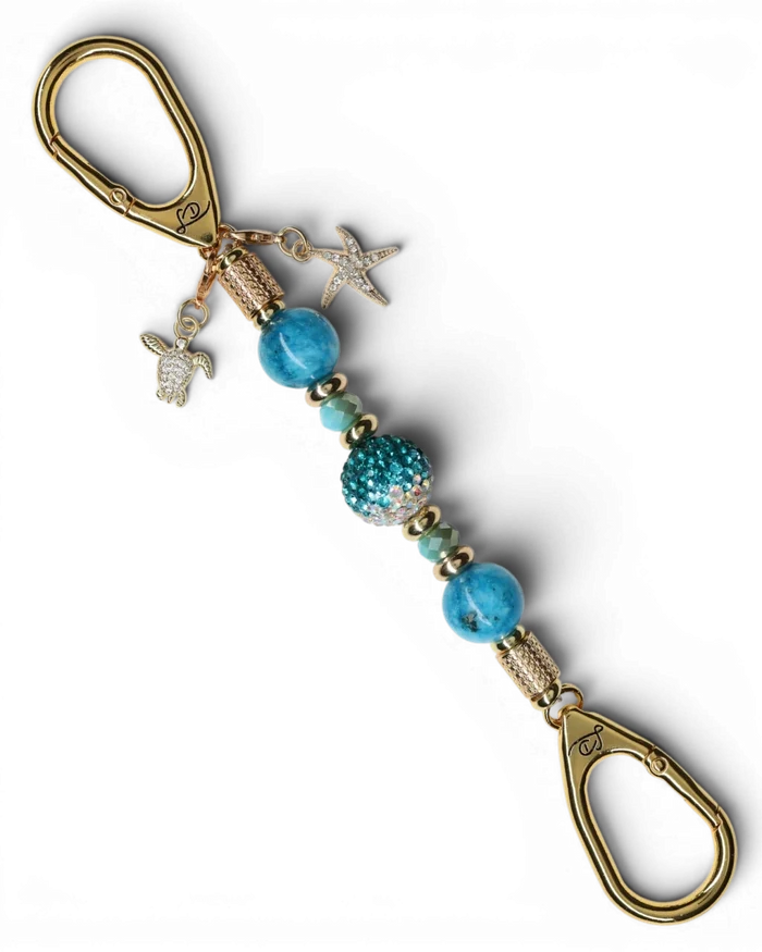 LD Keyfinder Golden Reef Mini keychain with aqua hemimorphite beads, crystal center bead, starfish and turtle charms, gold-plated hardware.