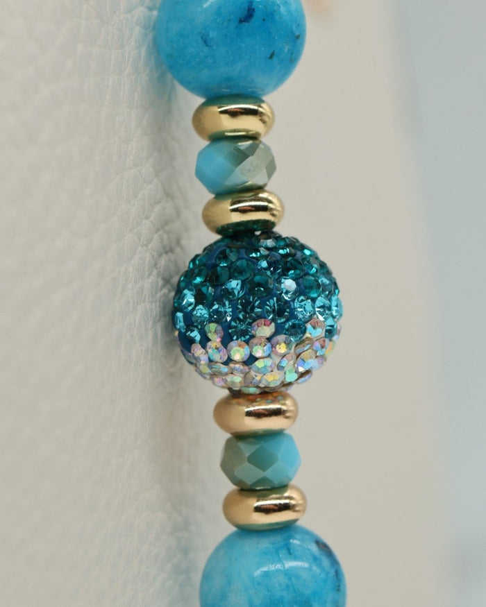 LD Keyfinder Golden Reef necklace with aqua hemimorphite beads, gold spacers, and a crystal disco ball bead.