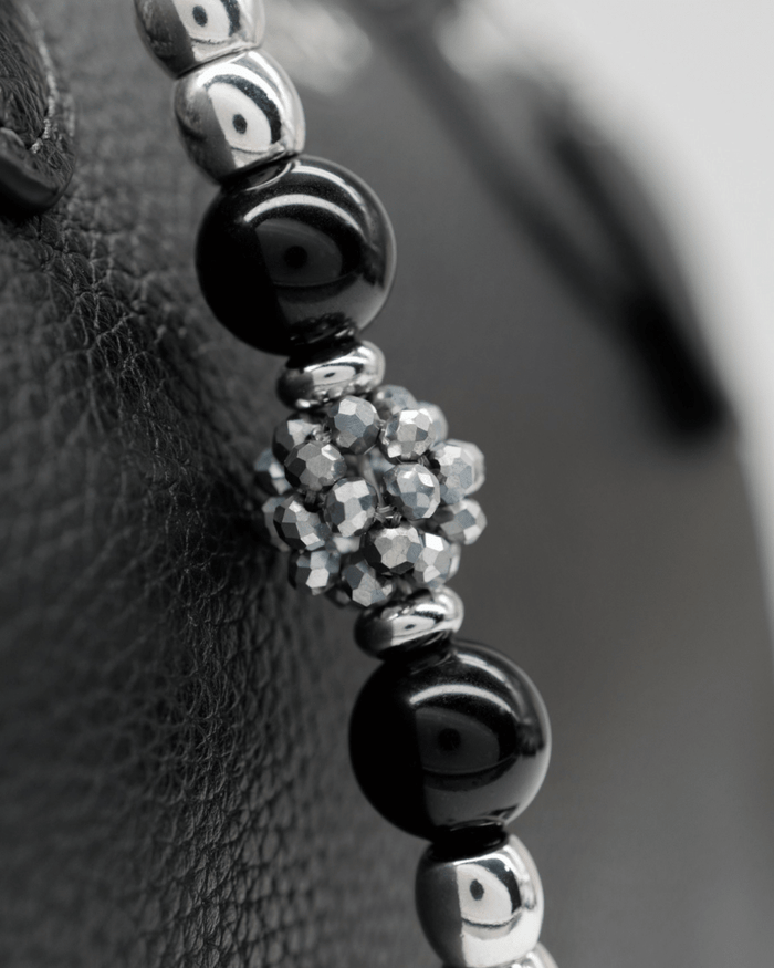 Handwoven electroplated glass center bead