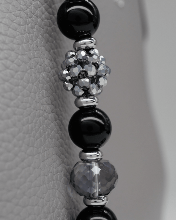 Handwoven electroplated glass center bead