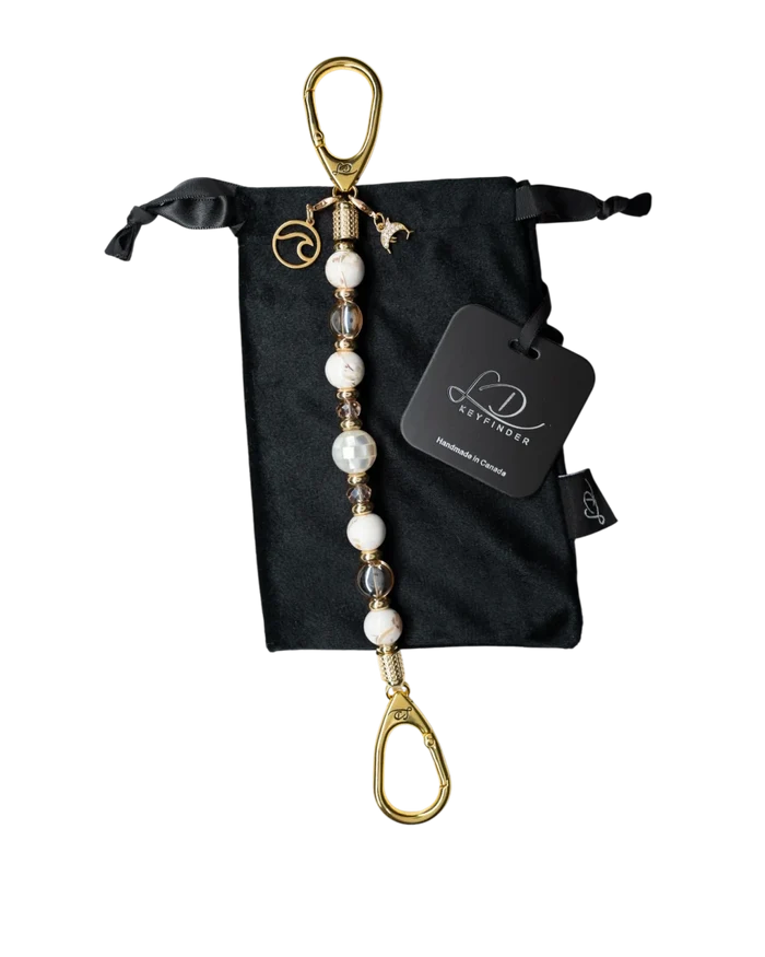 LD Keyfinder Mediterranean Glow beaded keychain with Mother of Pearl, ivory shells, gold beads, and ocean charms.