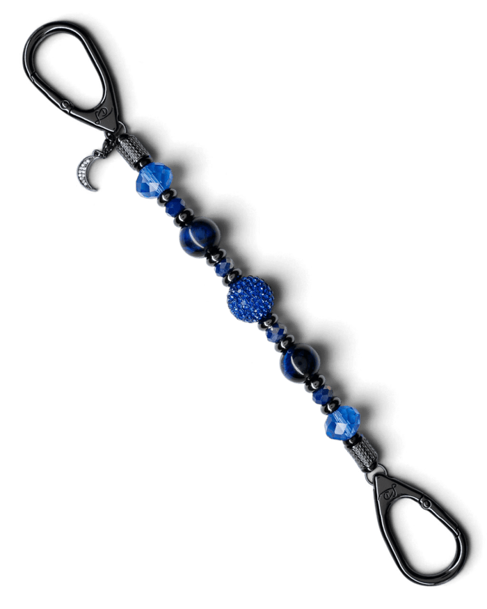 LD Keyfinder Midnight Sapphire beaded keychain with blue tiger eye, sapphire crystals, and a rhinestone moon charm.