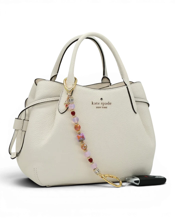 LD Keyfinder Opalite Bloom charm with pink opalite, ruby, and etched glass beads, and hummingbird charm.