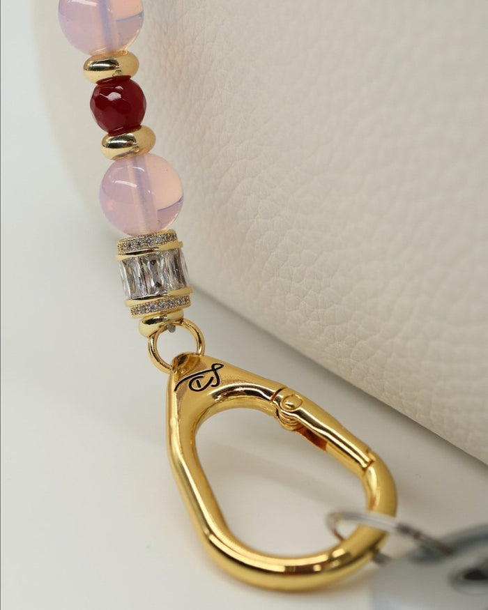 LD Keyfinder Opalite Bloom keychain with pink opalite, ruby, and orange glass beads, gold accents, and a hummingbird charm.