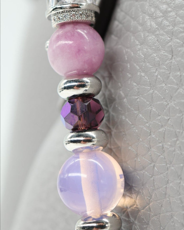 LD Keyfinder Orchid Flutter featuring purple lepidolite, pink opalite, faceted glass beads, and platinum spacers.