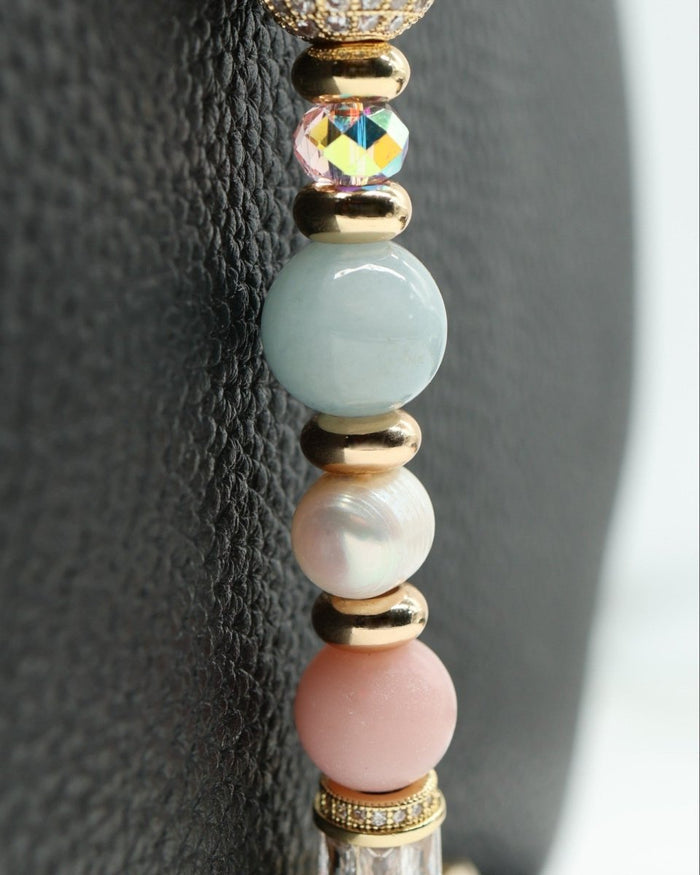 LD Keyfinder Pastel Garden bracelet with pink opal, freshwater pearls, aquamarine, and gold-plated beads.