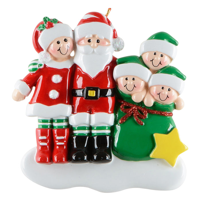 Christmas ornament of a family in Santa Claus costumes with a star on a white background
