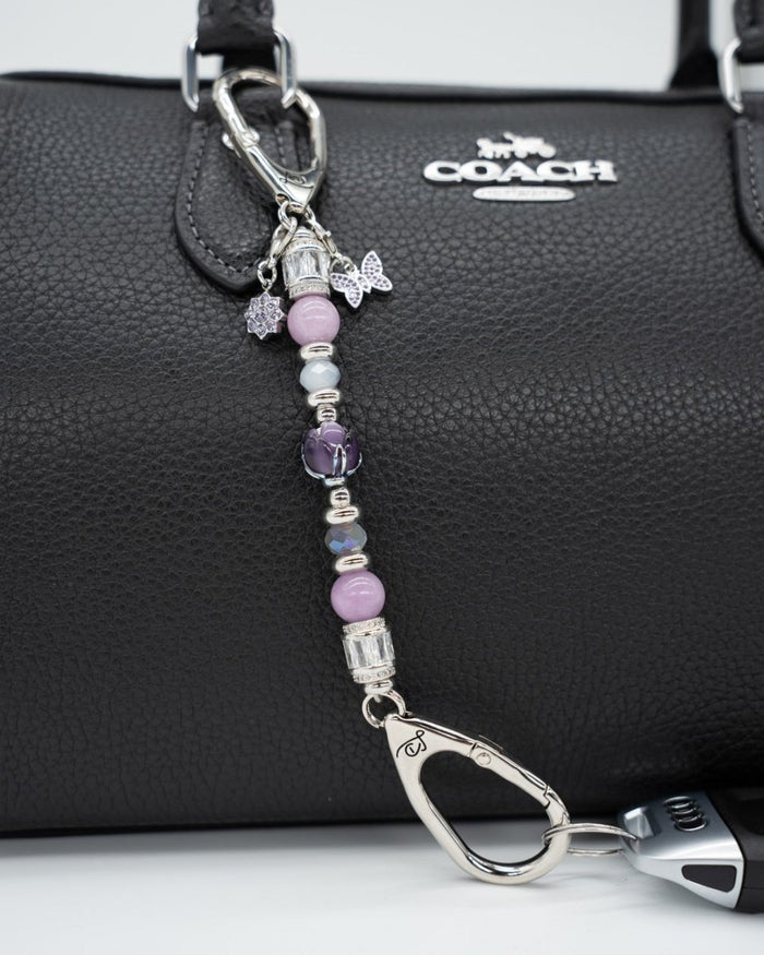 LD Keyfinder Petite Blooming Joy accessory with lavender Lepidolite, purple Jade, glass tulip, and butterfly charms.