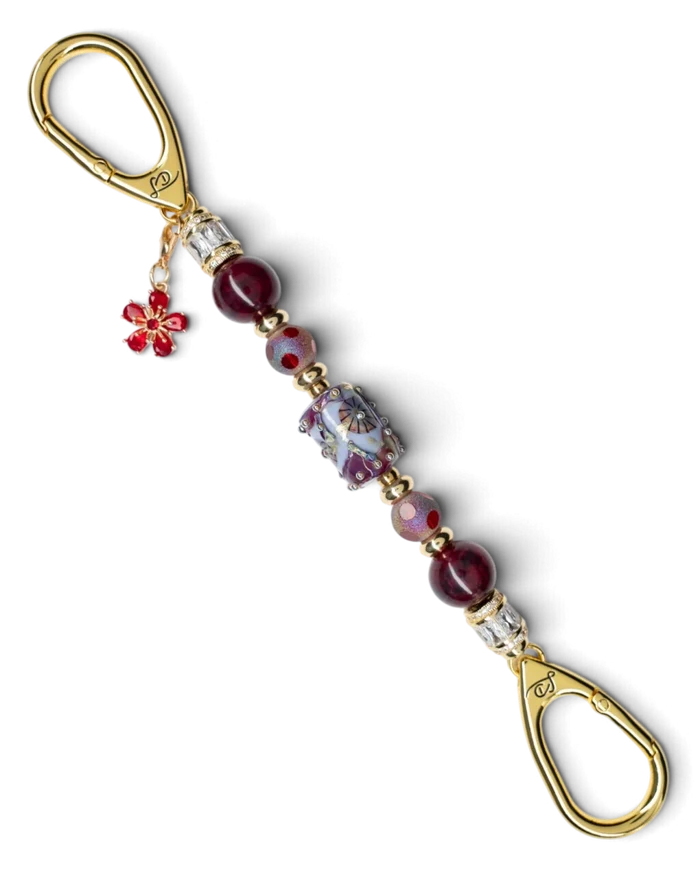 LD Keyfinder Petite Bordeaux Bloom featuring burgundy agate, artisan glass, gold-plated accents, and a red flower charm.