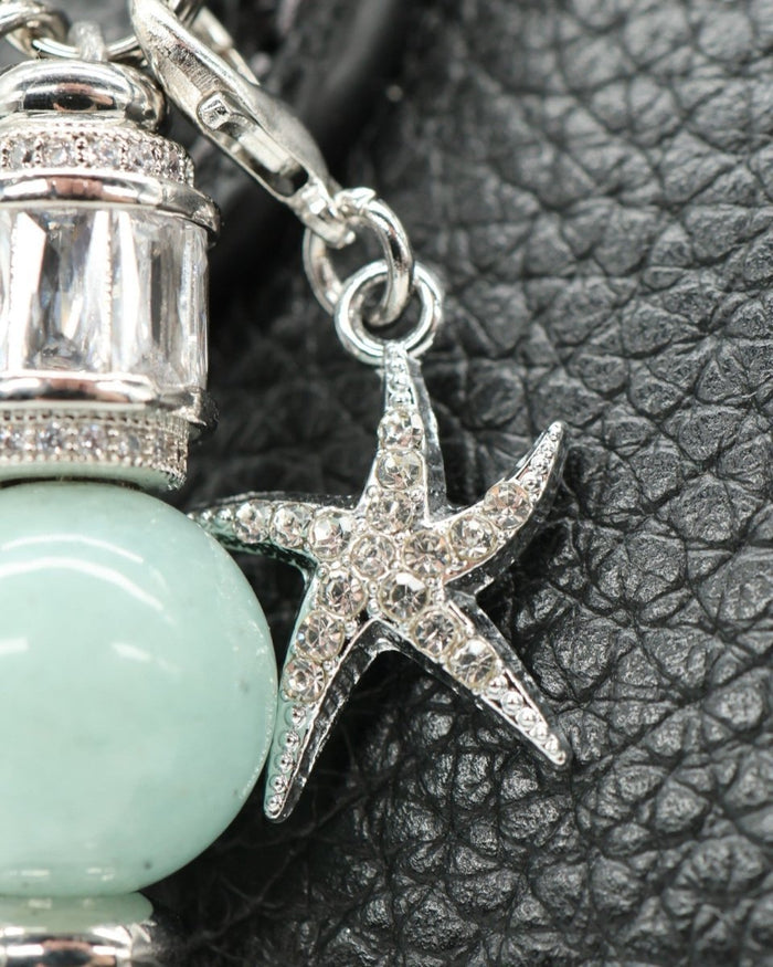 LD Keyfinder Petite Caribbean Pearl featuring a rhinestone starfish charm, aqua jade, and white glass beads.