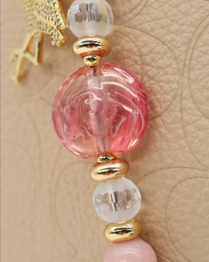 LD Keyfinder Petite Flamingo Fantasy featuring pink opal beads, handcrafted glass, and a gold rhinestone flamingo charm.