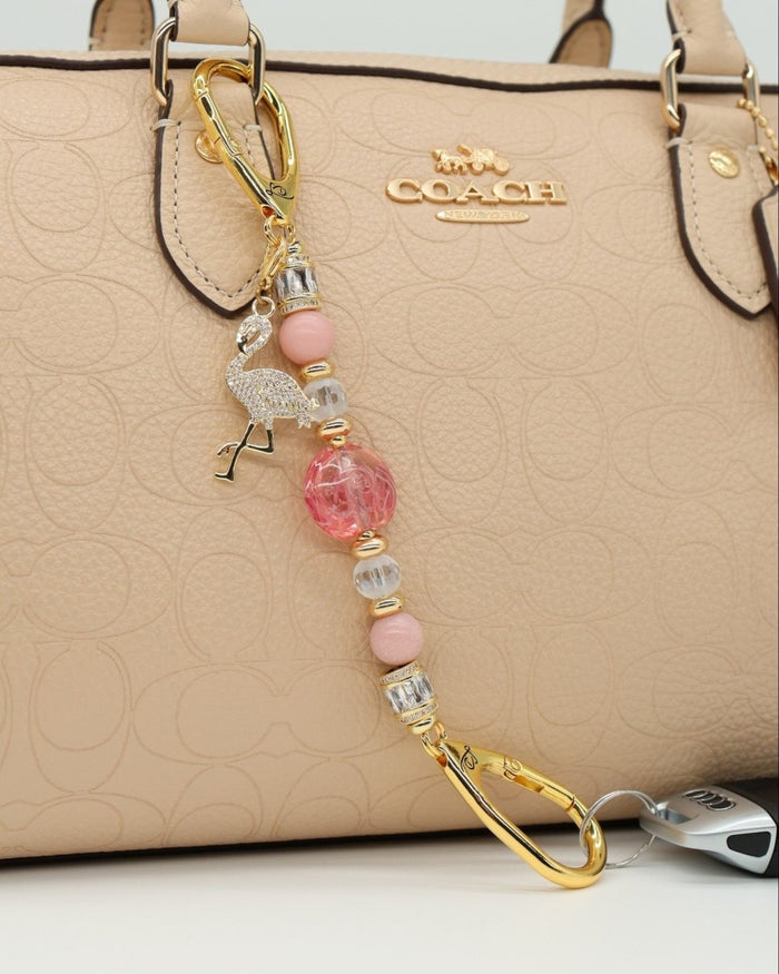 LD Keyfinder Petite Flamingo Fantasy beaded keychain with pink opal, glass beads, and a gold rhinestone flamingo charm.