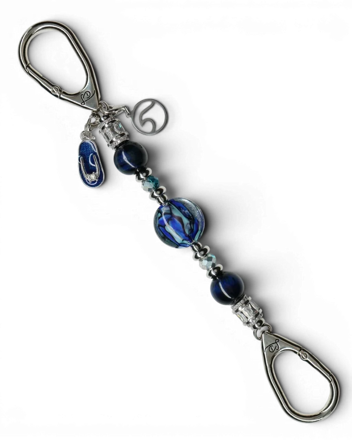 LD Keyfinder Ocean Mosaic Petite featuring artisan blue glass, tiger eye beads, and ocean-themed charms on silver clips.