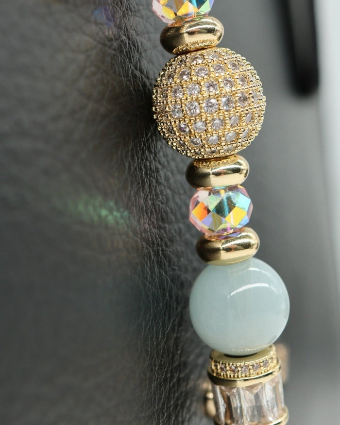 LD Keyfinder Petite Pastel Garden bracelet with aquamarine, pink glass beads, gold micropavé bead, and flower charm.