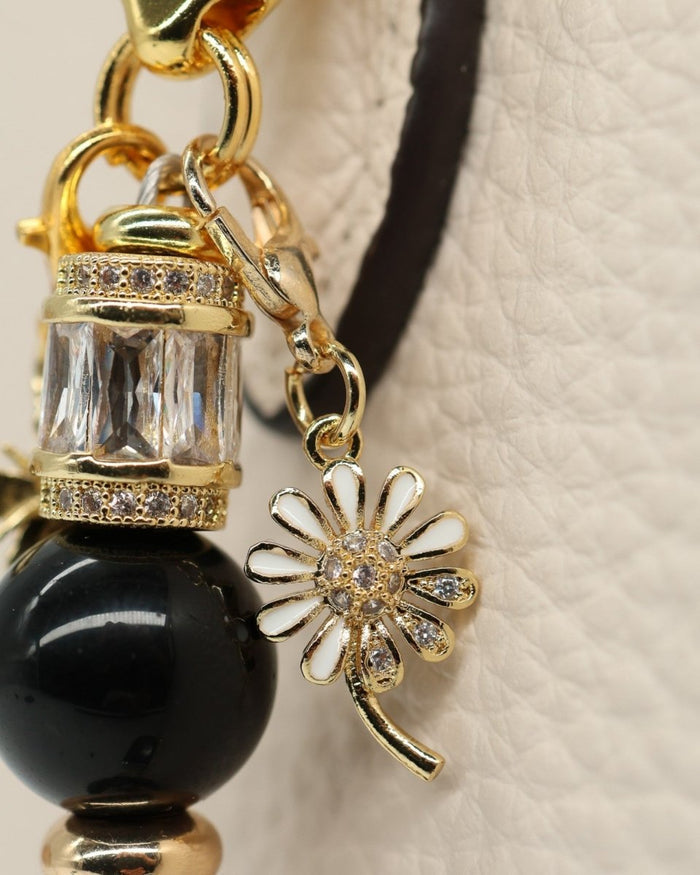 Micro pave 18kt gold plated daisy charm