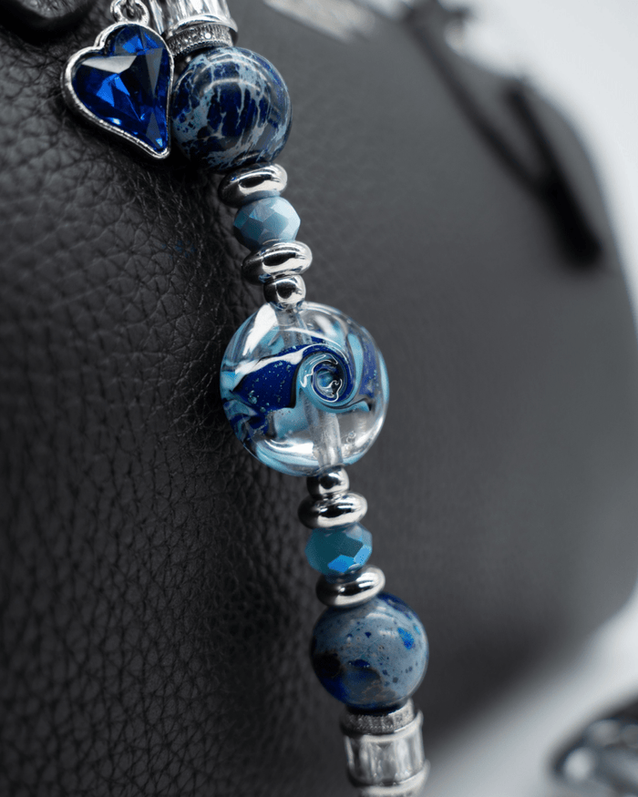 LD Keyfinder Petite Sapphire Allure featuring a handcrafted artisan glass bead, blue jasper, and sapphire heart charm.