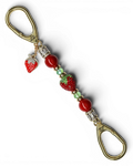 LD Keyfinder Petite Strawberry Fields key accessory with red shell pearls, green glass beads, and crystal strawberry.