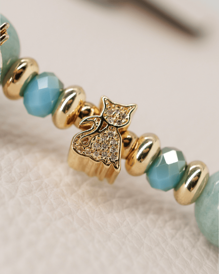 Micro pavé 18KT gold-plated cat center bead