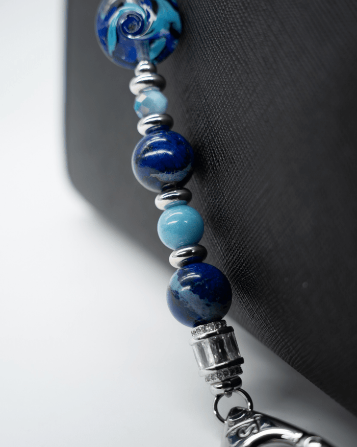 LD Keyfinder Sapphire Allure beaded accessory featuring blue jasper, larimar, and a handcrafted sapphire glass bead.