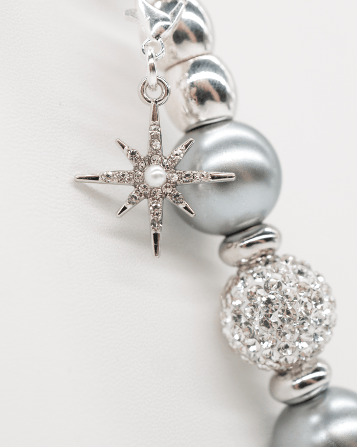 Silver plated rhinestone and faux pearl star charm