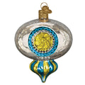 Decorative glass reflector ornament with blue and gold design on a white background