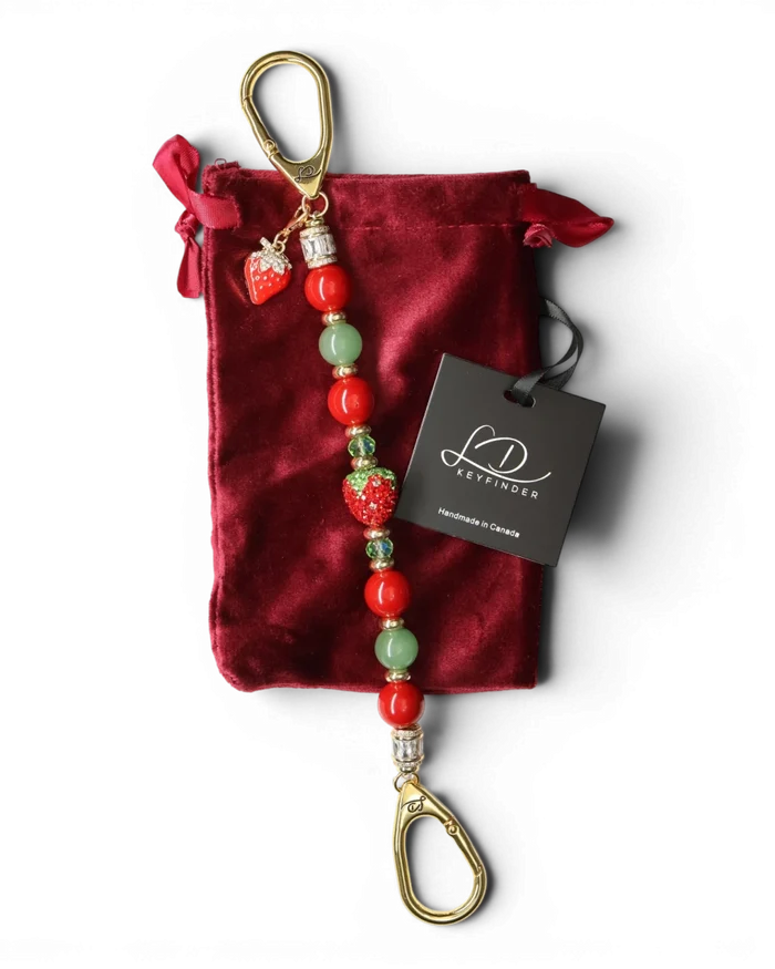 LD Keyfinder Strawberry Fields beaded keychain with red shell pearls, green aventurine, and crystal strawberry charm.