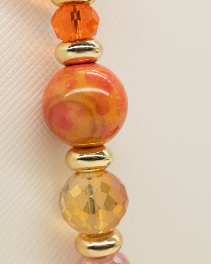 LD Keyfinder Summer Sunset beaded accessory featuring faceted cherry quartz, orange agate, and gold-plated accents.