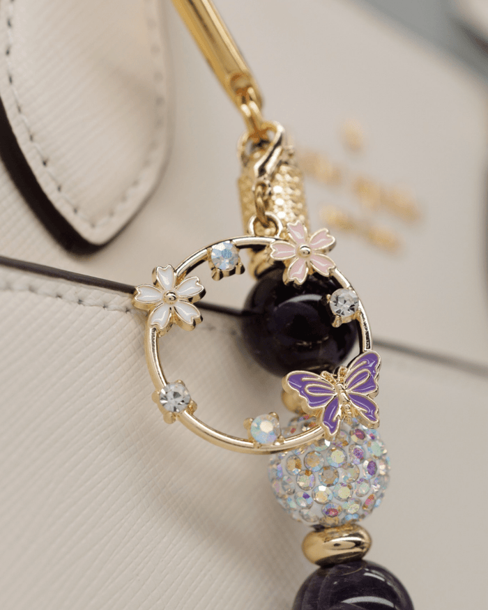 18KT Gold plated flower & butterfly charm