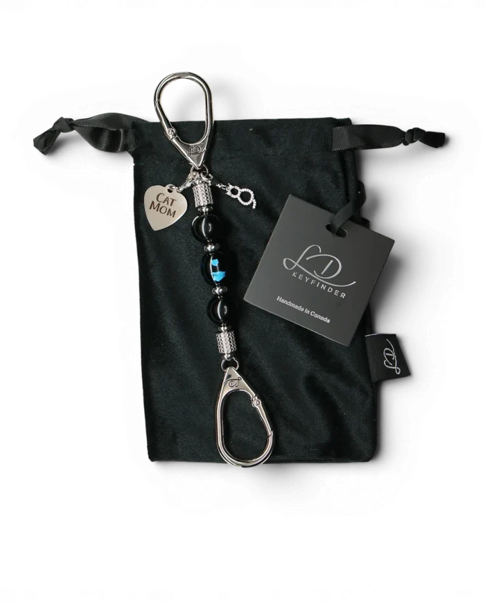LD Keyfinder Whisker Dreams-Mini keychain with black obsidian beads, blue foil cat bead, and Cat Mom charm on velvet