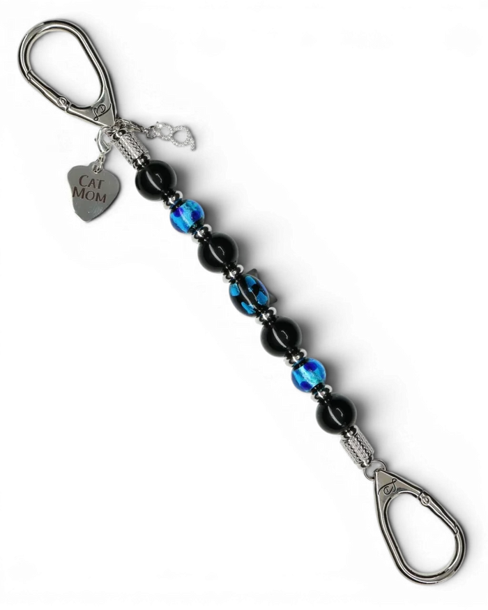 LD Keyfinder Whisker Dreams beaded keychain with black obsidian, blue foil glass, cat head charm, and Cat Mom heart tag.
