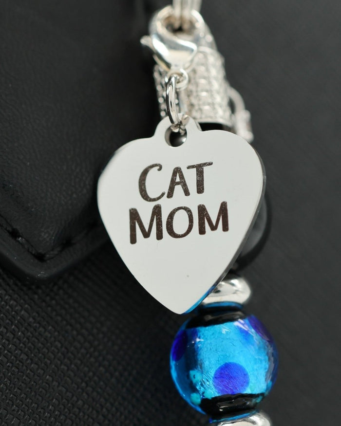 LD Keyfinder Whisker Dreams keychain featuring a heart-shaped Cat Mom charm, blue foil glass bead, and black obsidian.